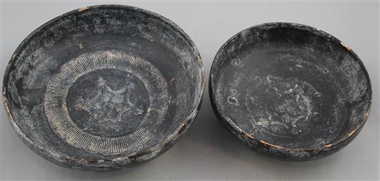 Two Greek blackware bowls, Apulia, c.4th century BC, 16.5cm and 19.5cm